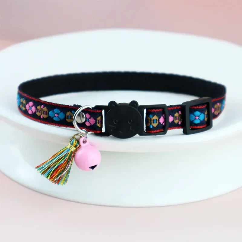 Adjustable cat collar with tassels and bells embellished