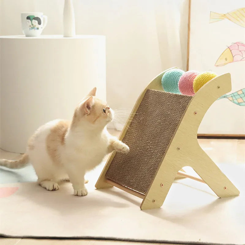 Cats climbing cardboard balls